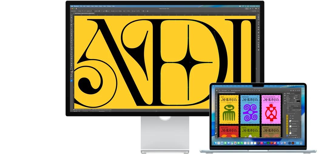Studio Display 和一台 Mac 笔记本电脑，屏幕上显示正在使用多个 Adobe 软件处理的项目。Studio Display 展示黑色文字在黄色背景上的特写画面，抗反射涂层有助于减少眩光。